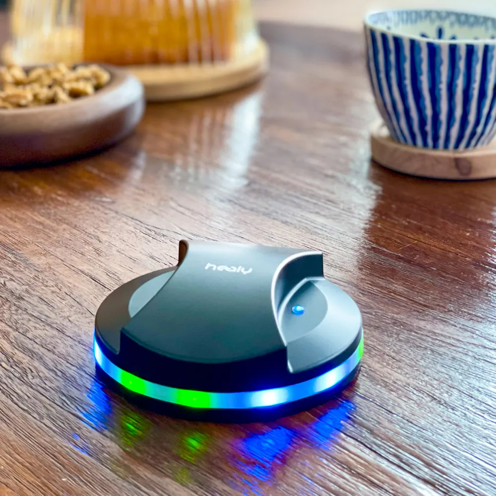 MagHealy Obsidian on a wooden table with its light ring glowing